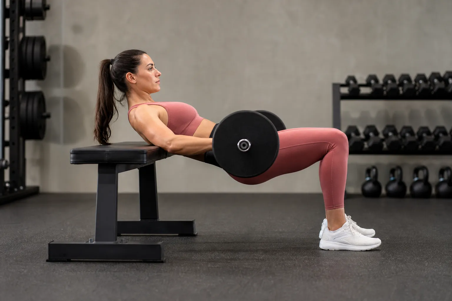 Athlete performing a barbell hip thrust